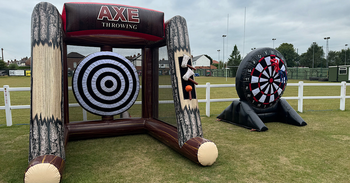 inflatable axe throwing and giant velcro dartboard corporate team building games Yorkshire