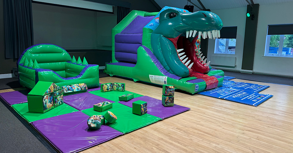 3D Dinosaur Bouncy Castle With Slide at Cluntergate Centre Horbury